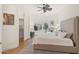 Comfortable main bedroom with hardwood floors and neutral colors at 5690 E Canyon Creek Cir, Carefree, AZ 85377