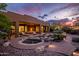 Beautiful backyard oasis with a pool, spa, and desert landscaping, perfect for relaxing and entertaining at 5690 E Canyon Creek Cir, Carefree, AZ 85377