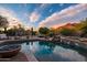 Backyard pool with rock waterfall features and mountain views at 5690 E Canyon Creek Cir, Carefree, AZ 85377