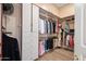 A walk-in closet with shelving and clothing racks on all sides at 5690 E Canyon Creek Cir, Carefree, AZ 85377