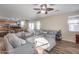 A spacious living area showcases an open floor plan, comfortable seating, and abundant natural light at 5826 W Plum Rd, Phoenix, AZ 85083