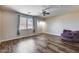 This large room would make a great main bedroom with hardwood floors and a view at 5826 W Plum Rd, Phoenix, AZ 85083