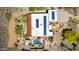 Aerial view of home with a private swimming pool, patio, and solar panels at 5978 E Chuckwalla Trl, Cave Creek, AZ 85331