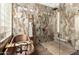 Luxurious bathroom with a copper soaking tub, glass-enclosed shower, and marble accents at 5978 E Chuckwalla Trl, Cave Creek, AZ 85331