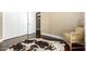 An inviting room featuring a cowhide rug and a comfortable armchair at 5978 E Chuckwalla Trl, Cave Creek, AZ 85331