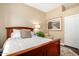 Comfortable bedroom with a wood-frame bed and a serene ambiance at 5978 E Chuckwalla Trl, Cave Creek, AZ 85331