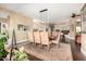 Elegant dining room with hardwood floors, modern lighting, and an open floor plan at 5978 E Chuckwalla Trl, Cave Creek, AZ 85331