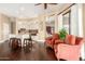 Open-concept living room next to the kitchen featuring hardwood floors and neutral decor at 5978 E Chuckwalla Trl, Cave Creek, AZ 85331