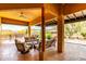 Inviting covered patio with comfortable seating area and pool view at 5978 E Chuckwalla Trl, Cave Creek, AZ 85331