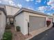 Charming condo featuring private entrance, garage and beautifully landscaped front with lovely flowers at 6130 N 12Th Way, Phoenix, AZ 85014