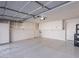 Spacious garage with built-in storage cabinets, offering plenty of room for vehicles and projects at 6130 N 12Th Way, Phoenix, AZ 85014