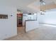 Open concept kitchen and living room area; the house has lots of natural light at 6130 N 12Th Way, Phoenix, AZ 85014