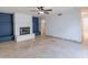Spacious living room with a modern fireplace and sleek design, perfect for entertaining at 6130 N 12Th Way, Phoenix, AZ 85014