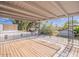 Enjoy the view from this covered patio with wrought iron railing and wooden deck at 6130 N 12Th Way, Phoenix, AZ 85014