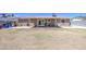 Large, sunny backyard with covered patio, ideal for outdoor activities at 6939 W Cambridge Ave, Phoenix, AZ 85035