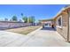 Large backyard features an extended patio, shed and privacy block wall at 6939 W Cambridge Ave, Phoenix, AZ 85035