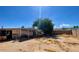 View of the backyard and exterior of the home showing land features at 7214 S 42Nd St, Phoenix, AZ 85042