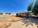 View of the backyard and exterior of the home showing land features at 7214 S 42Nd St, Phoenix, AZ 85042