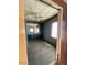 Bedroom featuring a ceiling fan, window and a built-in dresser/storage unit with mirror at 7214 S 42Nd St, Phoenix, AZ 85042