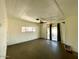 An empty room featuring linoleum floors and natural light from exterior windows at 7214 S 42Nd St, Phoenix, AZ 85042