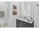 Bathroom features modern fixtures, vanity lighting, and a glass shower at 7438 E San Jacinto Dr, Scottsdale, AZ 85258