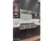 Stunning kitchen detail featuring a professional-grade stainless steel range and sleek cabinetry at 7438 E San Jacinto Dr, Scottsdale, AZ 85258