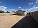 Spacious back yard with block fence offering privacy and plenty of room for activities at 7664 W Vermont Ave, Glendale, AZ 85303