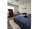 Bedroom with carpet, dresser and window at 7664 W Vermont Ave, Glendale, AZ 85303