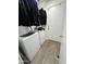 Convenient laundry room with washer, dryer, and storage space at 7664 W Vermont Ave, Glendale, AZ 85303