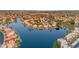 Breathtaking aerial view of a lakeside community, highlighting waterfront homes, and lush landscaping at 780 S Lagoon Dr, Gilbert, AZ 85233