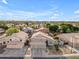 Scenic aerial view of a home, showcasing its neighborhood and surrounding landscape at 780 S Lagoon Dr, Gilbert, AZ 85233