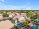 Picturesque aerial view showcasing a home with a pool, patio, and lush backyard at 780 S Lagoon Dr, Gilbert, AZ 85233
