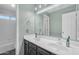 Spacious bathroom with dual sinks, large mirror, tile flooring, and a separate toilet and shower area at 780 S Lagoon Dr, Gilbert, AZ 85233
