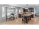 Spacious kitchen with a central island, granite countertops, and stainless steel appliances, perfect for Gathering meals at 780 S Lagoon Dr, Gilbert, AZ 85233
