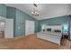 Large bedroom with high ceilings, recessed lighting, and a cozy feel at 780 S Lagoon Dr, Gilbert, AZ 85233