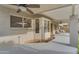 Inviting patio with a ceiling fan, swing, and convenient access to the backyard area at 780 S Lagoon Dr, Gilbert, AZ 85233