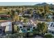 Breathtaking aerial view of the stunning home with a private pool in a lush, green neighborhood at 7902 E Via Linda --, Scottsdale, AZ 85258