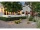 Beautiful home exterior featuring well-manicured desert landscaping and a welcoming walkway at 7902 E Via Linda --, Scottsdale, AZ 85258