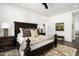 Comfortable main bedroom features a decorative headboard and stylish area rug at 7902 E Via Linda --, Scottsdale, AZ 85258