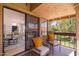 Charming balcony seating area with direct access to a bright living room and scenic outdoor views at 8700 E Mountain View Rd # 2011, Scottsdale, AZ 85258