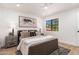 Cozy bedroom featuring a comfortable bed, stylish decor, and modern lighting at 8700 E Mountain View Rd # 2011, Scottsdale, AZ 85258