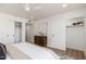Bright main bedroom features modern decor, closet, and ceiling fan at 8700 E Mountain View Rd # 2011, Scottsdale, AZ 85258