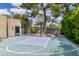 Outdoor basketball court with half-court layout, surrounded by landscaping at 9829 N 49Th Pl, Paradise Valley, AZ 85253