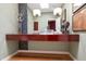 Unique bathroom featuring stone accents and stylish lighting at 9829 N 49Th Pl, Paradise Valley, AZ 85253