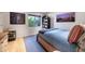 Cozy bedroom with hardwood floors, a comfortable bed, and natural light at 9829 N 49Th Pl, Paradise Valley, AZ 85253