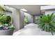 Welcoming entryway showcasing a modern design with plants, sunlight, and decorative tiles at 9829 N 49Th Pl, Paradise Valley, AZ 85253