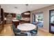 Open kitchen layout with granite countertops, stainless appliances and eat in table at 9829 N 49Th Pl, Paradise Valley, AZ 85253