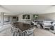 Covered patio with dining and lounge areas, perfect for entertaining at 9829 N 49Th Pl, Paradise Valley, AZ 85253