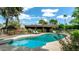 Beautiful pool area with lounge chairs surrounded by lush foliage at 9829 N 49Th Pl, Paradise Valley, AZ 85253