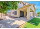 Spacious backyard with covered patio, turf, swimming pool, and block fence at 10234 E Lomita Ave, Mesa, AZ 85209